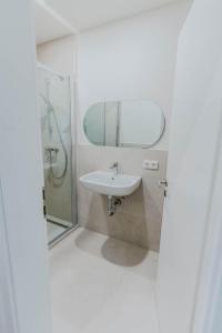 Et badeværelse på Penthouse am Französischen Garten - Frühstück - Altstadt - Parkplatz