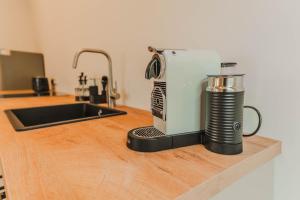 Køkken eller tekøkken på Penthouse am Französischen Garten - Frühstück - Altstadt - Parkplatz