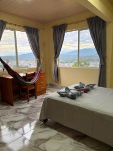 Ένα ή περισσότερα κρεβάτια σε δωμάτιο στο Hostal Tena Ñaui