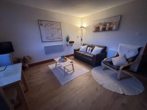 Χώρος καθιστικού στο Morenish Mews Kenmore Cottage