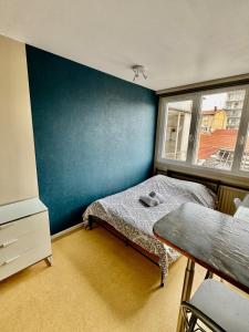 Postel nebo postele na pokoji v ubytování Hyper Centre de Valence - Studio N21