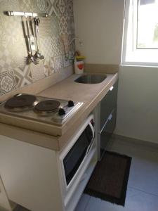 Кухня или мини-кухня в Pipa Solar Água 150
