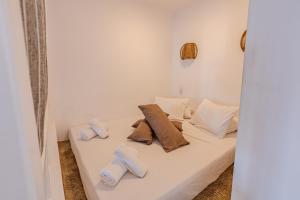 Ένα ή περισσότερα κρεβάτια σε δωμάτιο στο San Giorgio Leros