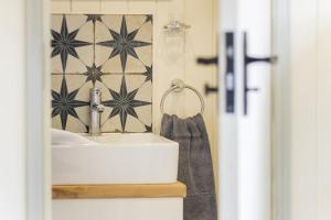 a bathroom with a sink and a towel at 1 Bed in Leintwardine oc-b29785 in Brampton Bryan