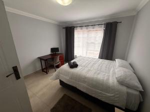 Una cama o camas en una habitación de Da Silva Apartment