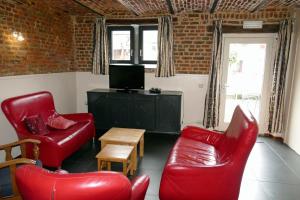 Et tv og/eller underholdning på Apartments Cour d'Aix