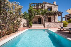 Bazén v ubytování Spilia Village Hotel & Villas nebo v jeho okolí