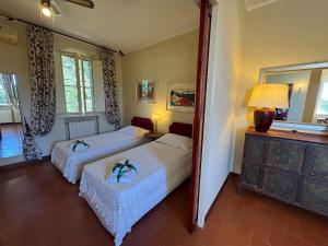 En eller flere senge i et værelse på Casa Mia + 68 billeder