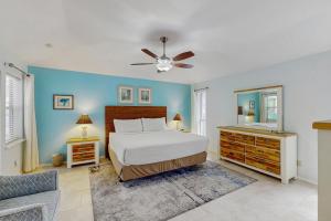 Postel nebo postele na pokoji v ubytování Lantana Bay Escape + 17 fotografií