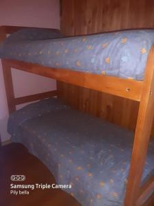 En eller flere senge i et værelse på Hermosa Casa Lican Ray