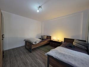 Postel nebo postele na pokoji v ubytování Mikra Homes24 in Glauchau + 5 fotografií