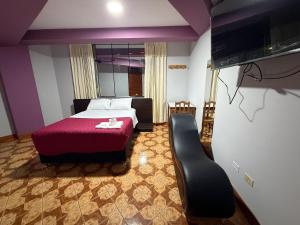 Postel nebo postele na pokoji v ubytování Hostal Nocheros