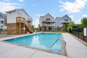 Πισίνα στο ή κοντά στο Dunewood by Sea Scape Properties