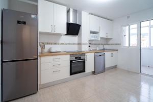 Køkken eller tekøkken på Cómodo apartamento vacacional en Murcia, El Palmar