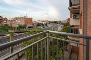 En balkon eller terrasse på Cómodo apartamento vacacional en Murcia, El Palmar