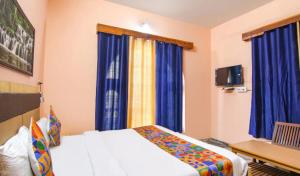 Un televizor și/sau centru de divertisment la Malti Guest House