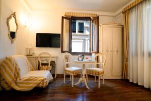 TV a/nebo společenská místnost v ubytování Casa Sul Molo