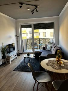 Posezení v ubytování Apartament Bajka nad Jeziorem