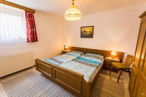 Postel nebo postele na pokoji v ubytování Johannes Gusterer