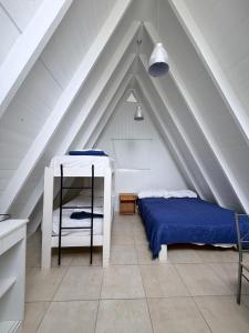 Una cama o camas en una habitación de Camping Corfo