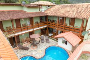 Bazén v ubytování VELINN Pousada Kyrios nebo v jeho okolí