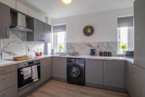 Køkken eller tekøkken på The Wishy - 2 Bedroom Flat in Newmains + 15 billeder