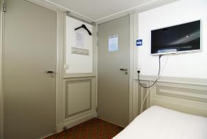 TV a/nebo společenská místnost v ubytování Kapitein Anna