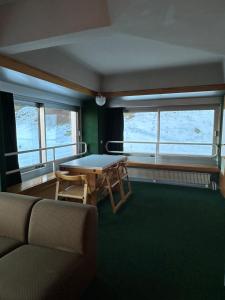 Et opholdsområde på La Dimora di Pace, adiacente alle piste per 7 persone + 16 billeder