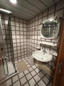 Et badeværelse på La Dimora di Pace, adiacente alle piste per 7 persone