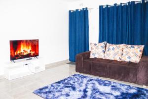 TV/trung tâm giải trí tại Mutethia Cottages