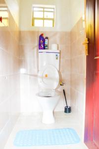 Phòng tắm tại Mutethia Cottages