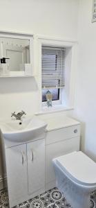 Et badeværelse på Driftwood Cottage + 18 billeder