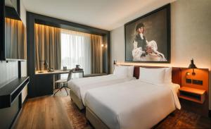 Postel nebo postele na pokoji v ubytování Radisson RED Galway + 126 fotografií