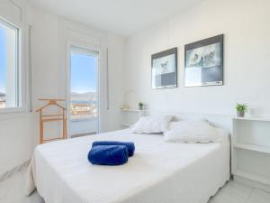 En eller flere senge i et værelse på Apartment Club Nautic-2 by Interhome