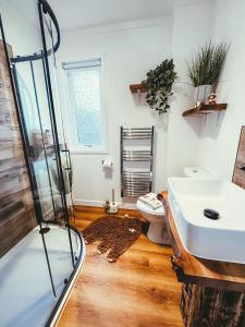 Et badeværelse på Highland Coo Lodge