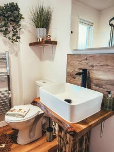 Et badeværelse på Highland Coo Lodge