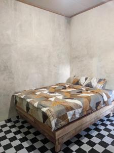 Postel nebo postele na pokoji v ubytování Local Garden Homestay