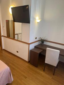 TV a/nebo společenská místnost v ubytování Green Hotel