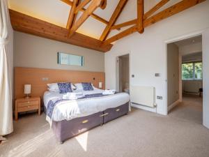 En eller flere senge i et værelse på Holiday Home Villa Gallery by Interhome