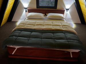 Una cama o camas en una habitación de Green Zone - Vikendica