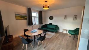 Posezení v ubytování Komfort Apartments Bösenrode + 16 fotografií