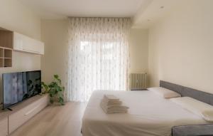 Ένα ή περισσότερα κρεβάτια σε δωμάτιο στο Bergamo Hideout