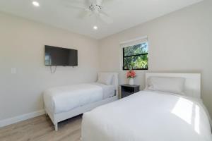 En eller flere senge i et værelse på The Florida's finest living villa