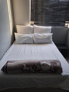 Postel nebo postele na pokoji v ubytování M J GuestHouse