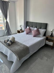 Ένα ή περισσότερα κρεβάτια σε δωμάτιο στο Casa Nube