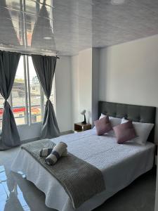 Ένα ή περισσότερα κρεβάτια σε δωμάτιο στο Casa Nube