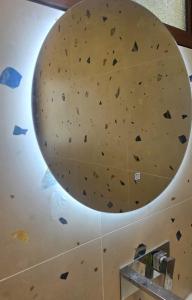 a large rock climbing wall in a gym at Cimarte The Path Lukove in Lukovë