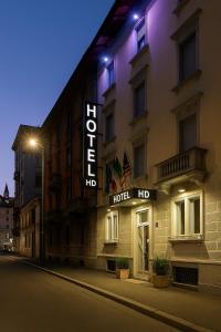 a hotel sign on the side of a building at HD Hotel in Milan