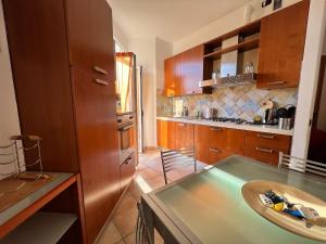 Η κουζίνα ή μικρή κουζίνα στο Kibilu - Via Ciro Menotti