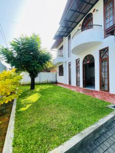 Κήπος έξω από το Amity Villa